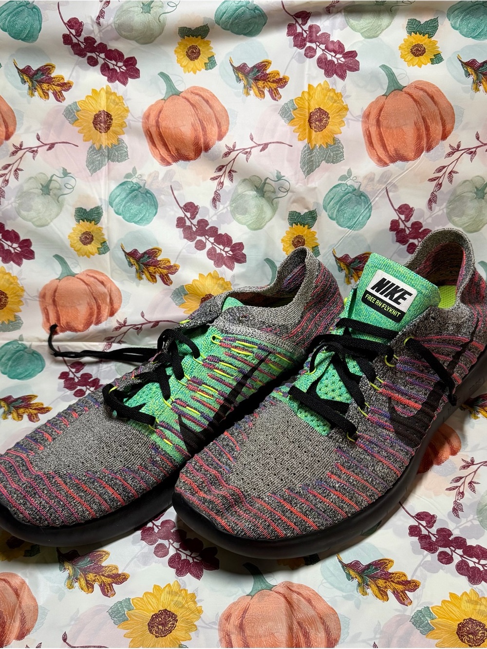 Nike Men’s Flyknit Sneakers in Gray with Green & Pink Accents 12.5